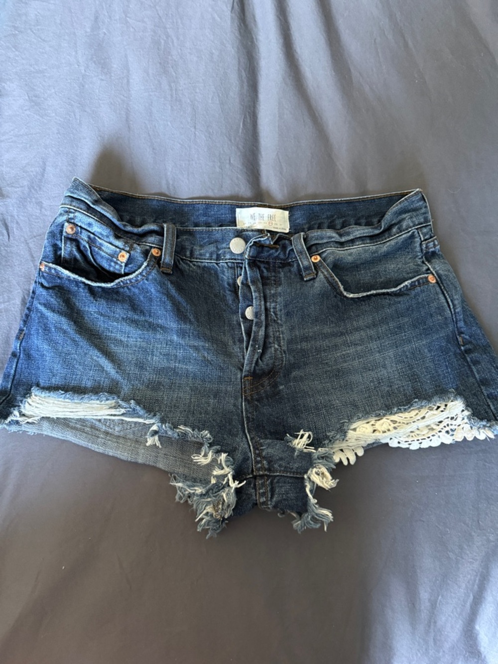 We The Free Distressed Dark Blue Denim Jean Shorts with Lace Trim
